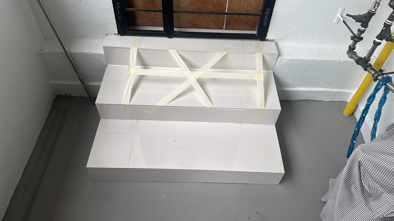 Renovation finishing work on a tiled ledge